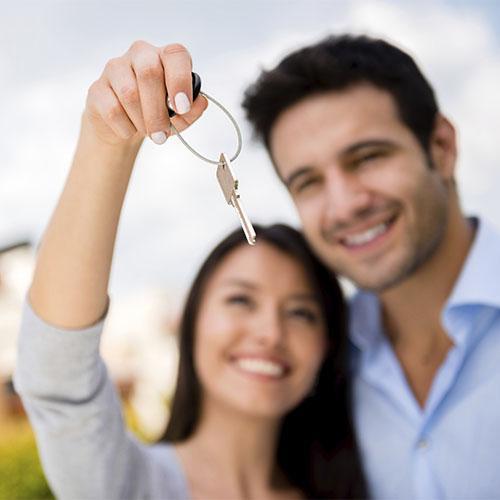 Staged photo of a first time home buyer Staged photo of a first time home buyer