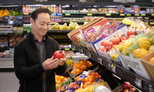 Photo of a man shopping local.