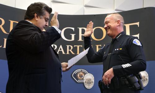 Photo of childhood friend Ric Lerma administering oath to DaRé.