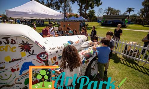 2020 Art in the Park cover photo of kids painting a car.