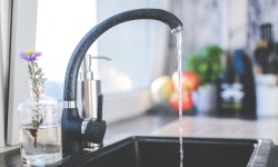 Kitchen sink with running water