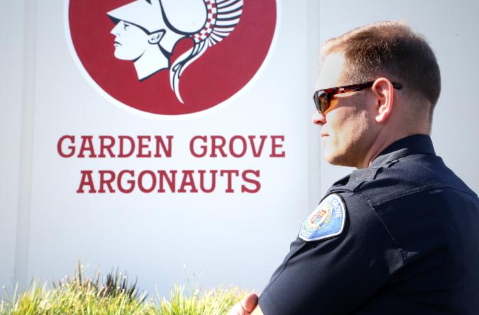 Photo of a school resource officer at Garden Grove High School. 